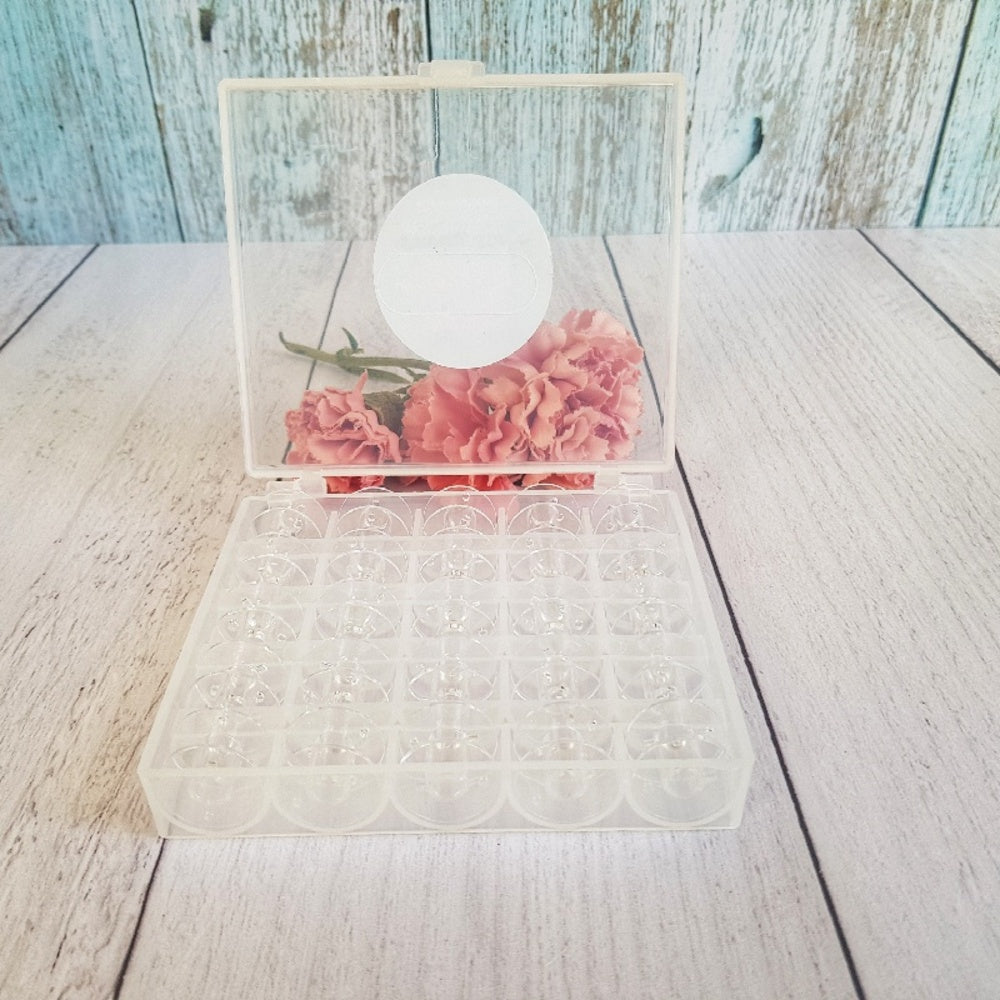 Caja con 25 carretes